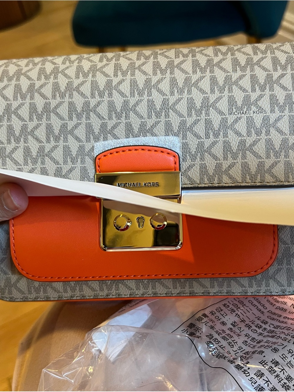 Michael Kors Monogram Shoulder Clutch in Orange and MK logos - Picture 4 of 4